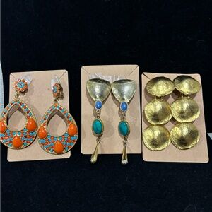 Three pairs of gold tone clip on earrings Orange southwest modern brushed gold